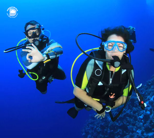 Fun Dive Package Experience the thrill of diving for beginners, exploring vibrant reefs under expert guidance in crystal-clear waters.